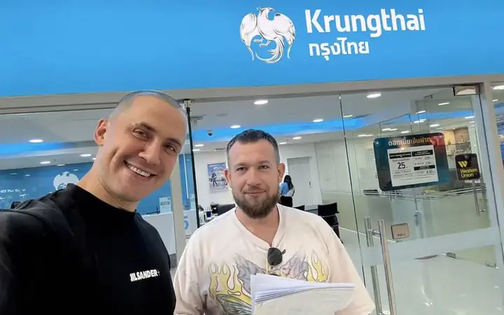 Mike with the client at a Krungthai bank branch